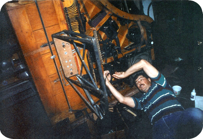 Tim Cragg servicing a player piano